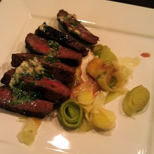Grilled Steak with Garlic-Brandy Butter and Leeks